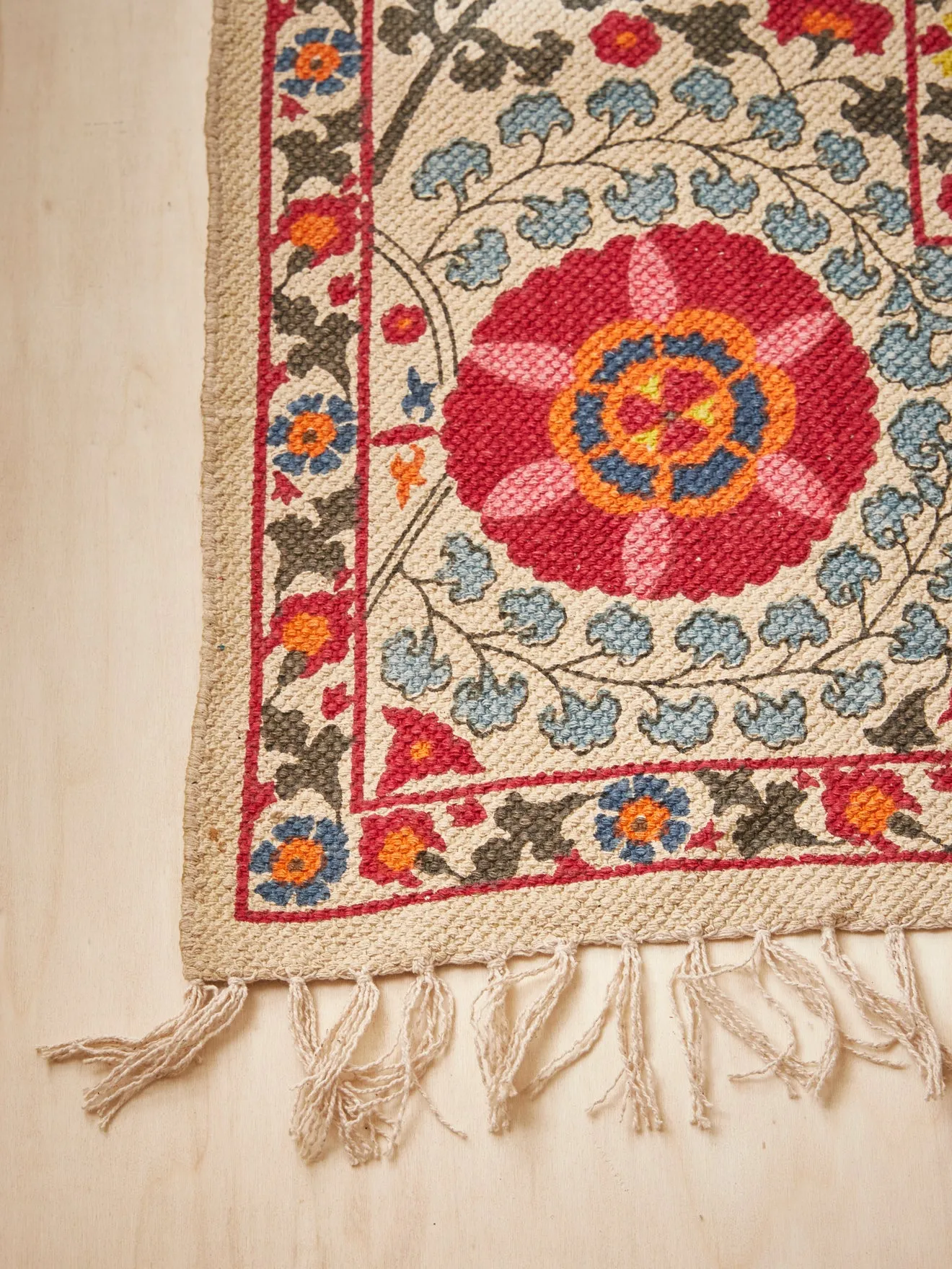 Tapis coton fleuri